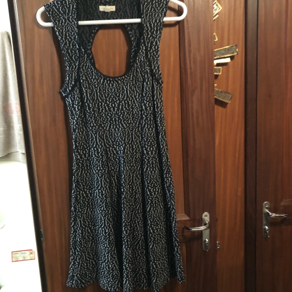 Very flattering urban outfitters black dress.